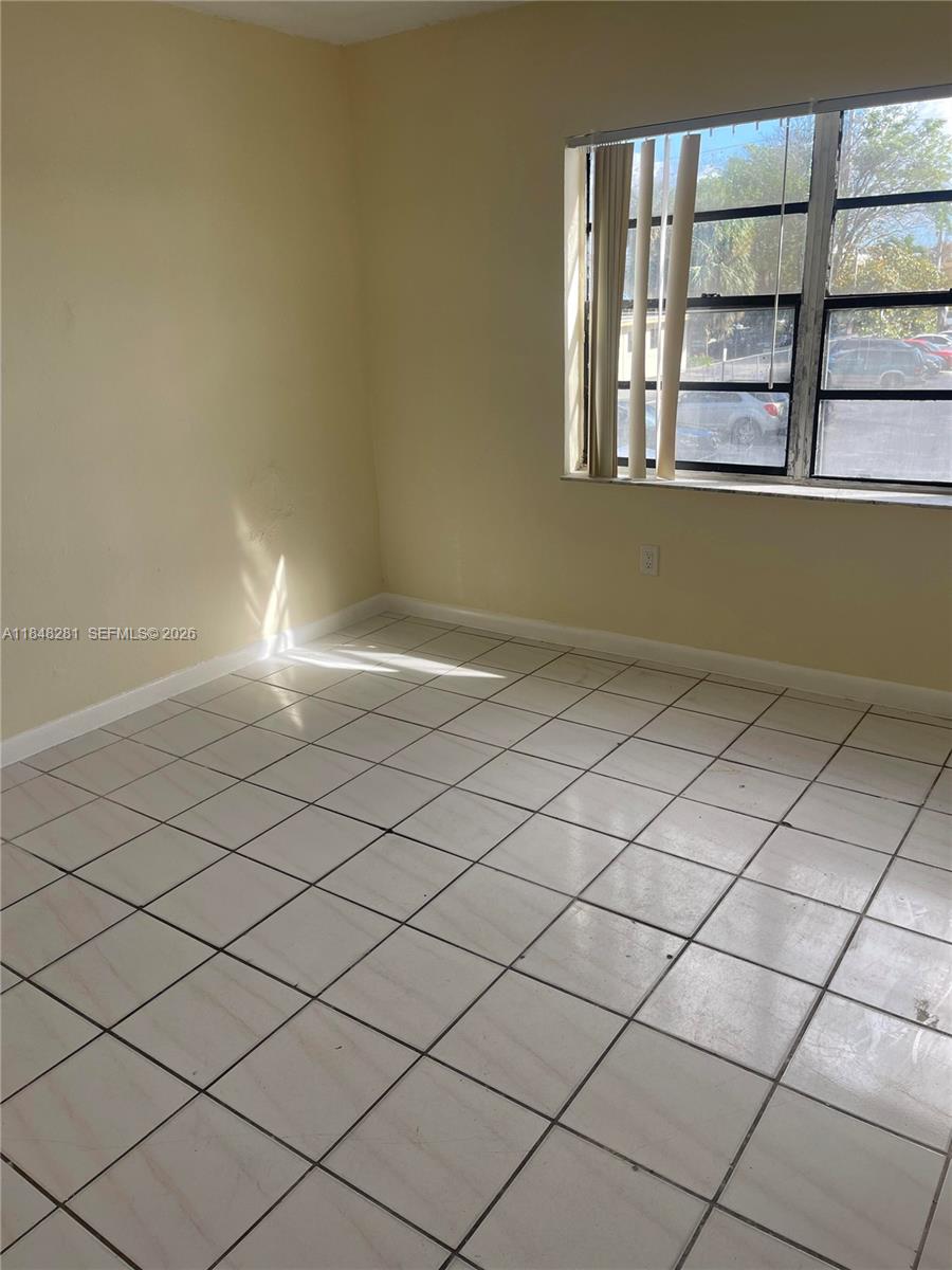 1325 West 68th Street, Unit 514 Hialeah, FL 33014 - Photo 10 of 20 a view of empty room
