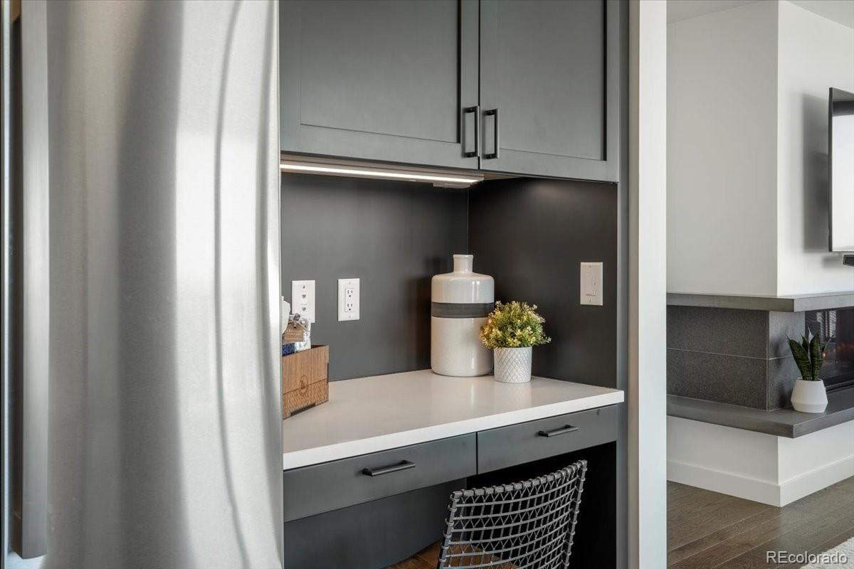 1750 Wewatta Street, Unit 1701 Denver, CO 80202 - Photo 19 of 35 a kitchen with a sink and cabinets