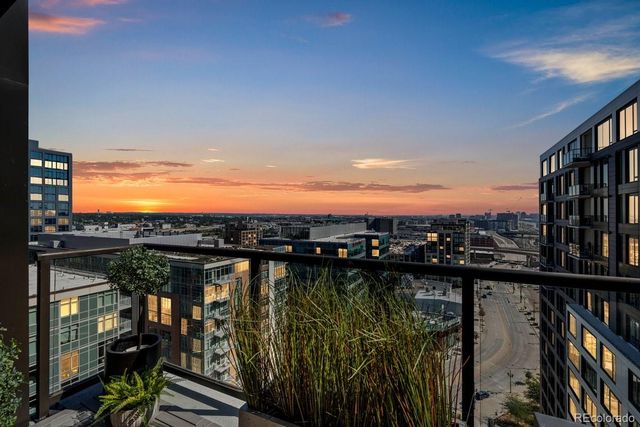 a view of a balcony next to a lake view