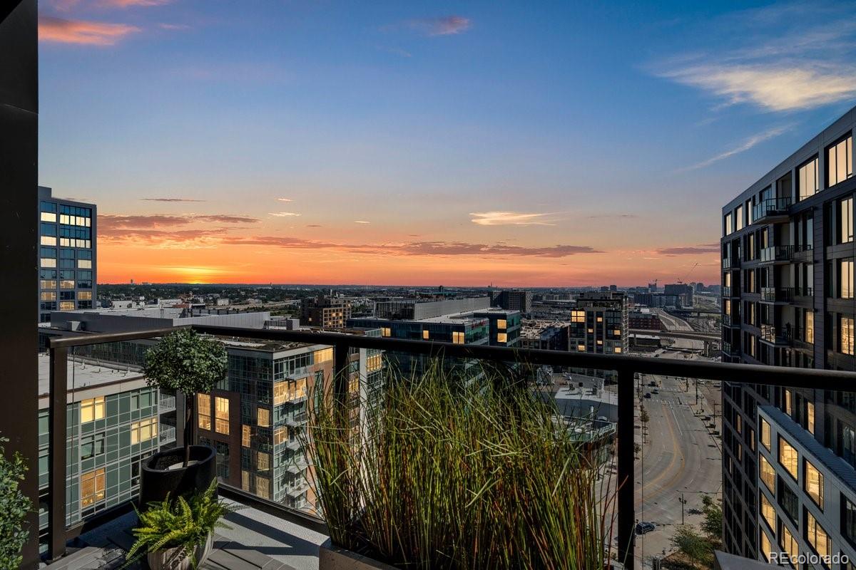 1750 Wewatta Street, Unit 1701 Denver, CO 80202 - Photo 21 of 35 a view of a balcony next to a lake view