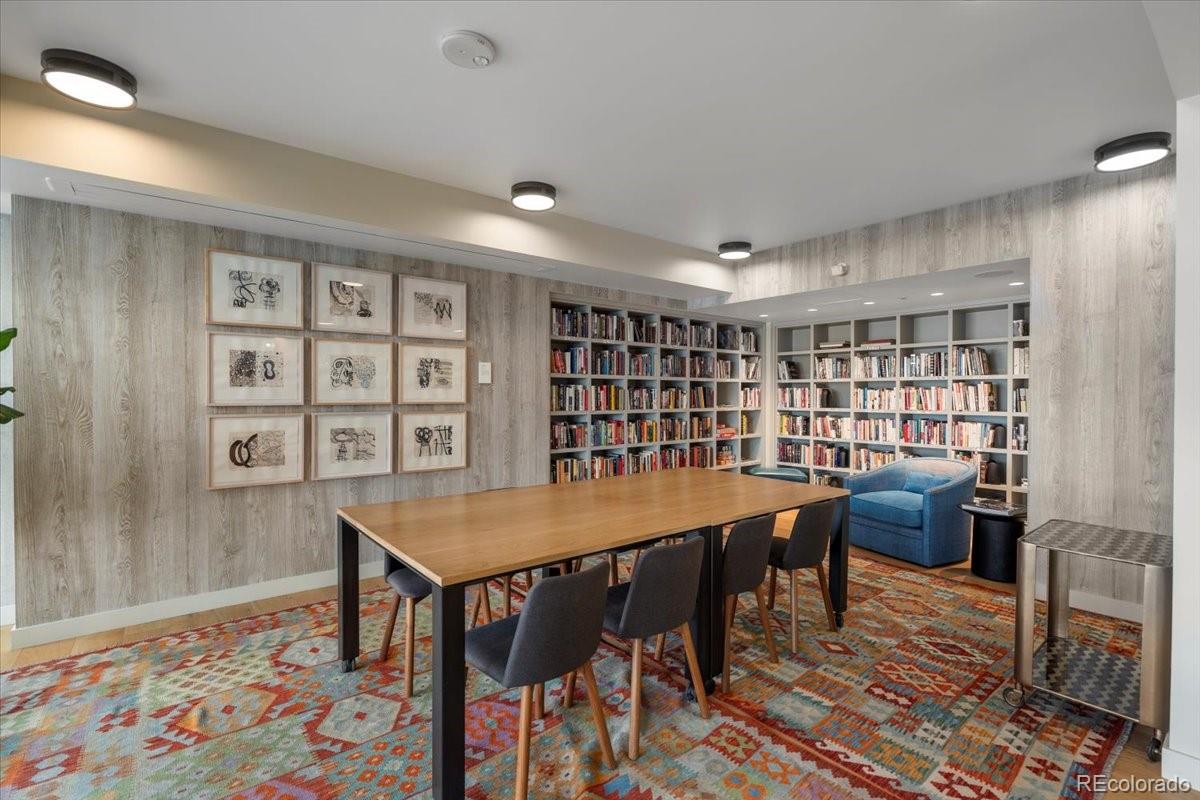 1750 Wewatta Street, Unit 1701 Denver, CO 80202 - Photo 29 of 35 a view of a workspace with furniture and wooden floor