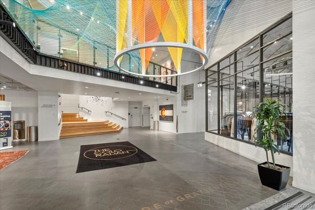 a view of lobby with furniture and a potted plant