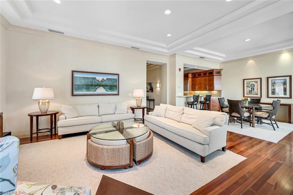 868 5th Avenue South, Unit 3A Naples, FL 34102 - Photo 4 of 21 a living room with furniture and a table