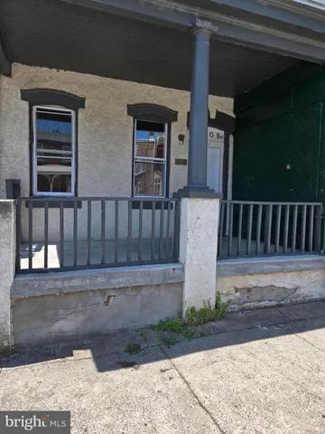 a view of a bench in the patio