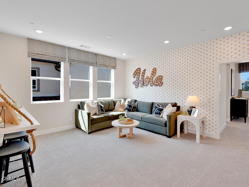 115 Yellow Birch Lane Piru, CA 93040 - Photo 13 of 18 a living room with furniture and a potted plant