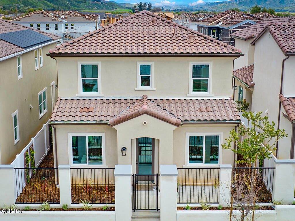 115 Yellow Birch Lane Piru, CA 93040 - Photo 2 of 18 a front view of a house with a yard