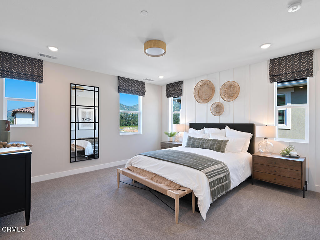 115 Yellow Birch Lane Piru, CA 93040 - Photo 10 of 18 a bedroom with a bed and painting on the wall