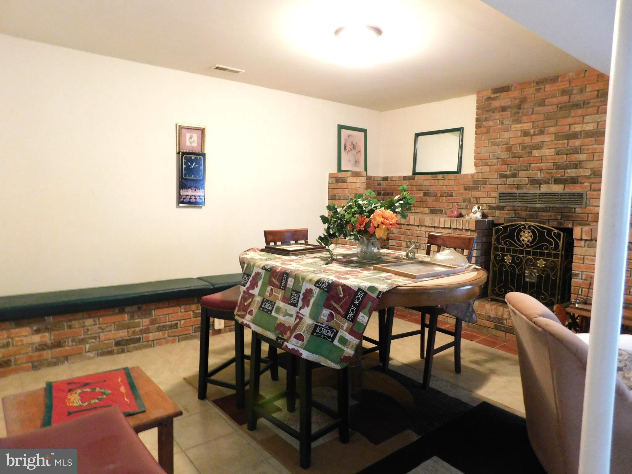 8012 Bradshaw Road Kingsville, MD 21087 - Photo 16 of 20 LL Family Room with Brick Fireplace