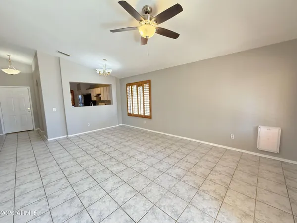 a view of an empty room and window