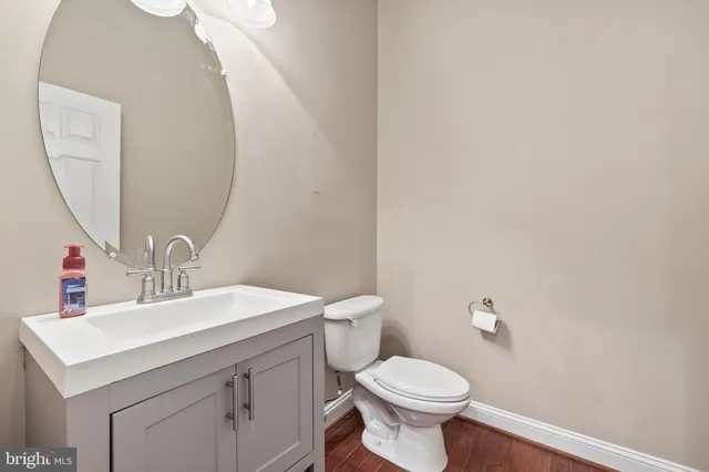 a spacious bedroom with a large bed and a fireplace