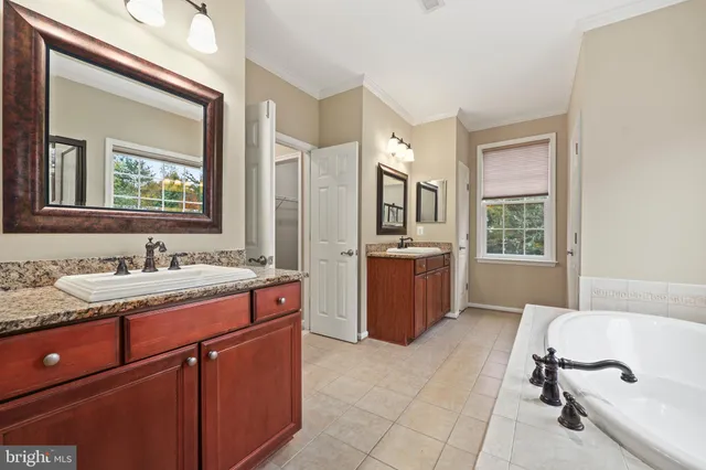 a view of yard with swimming pool and green space