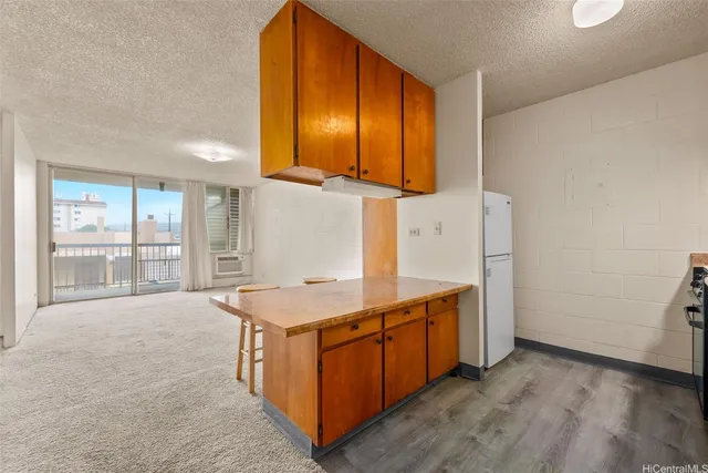 a spacious bathroom with a granite countertop sink and a mirror