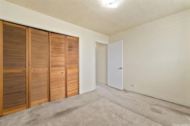 an empty room with closet