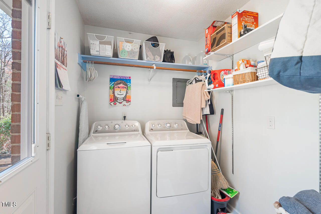 6014 Burgundy Road Durham, NC 27712 - Photo 36 of 46 a utility room with dryer and washer