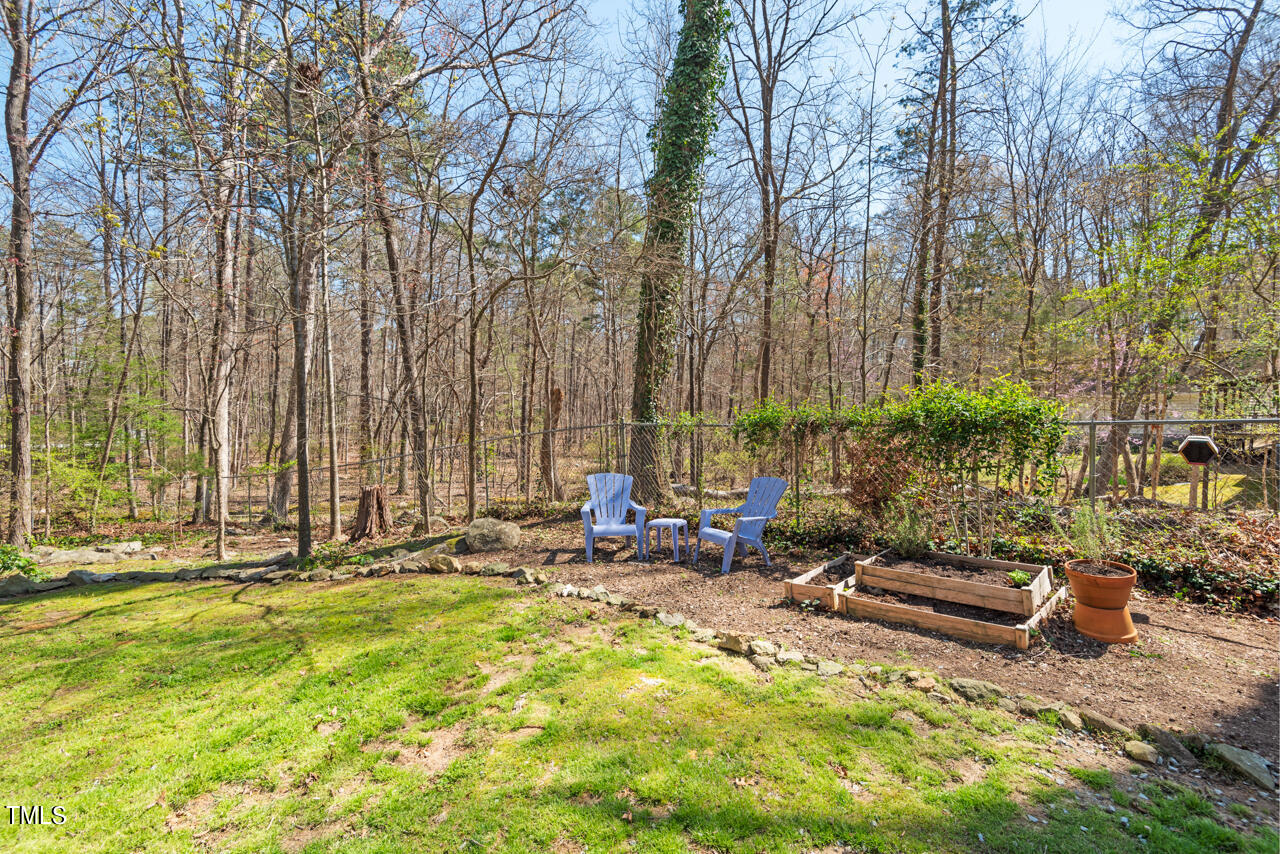 6014 Burgundy Road Durham, NC 27712 - Photo 42 of 46 a view of swimming pool with chairs in patio