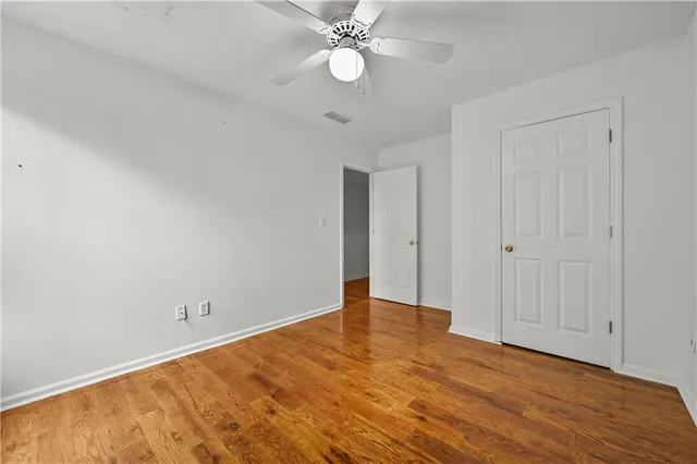 a bathroom with a shower sink and toilet