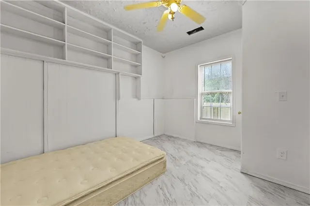 a bathroom with a sink and shower