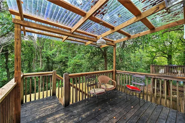 a view of a two chairs in the deck