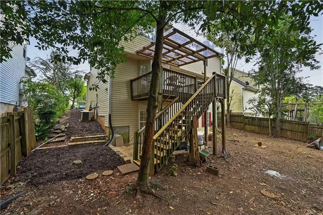 a view of a house with wooden stairs
