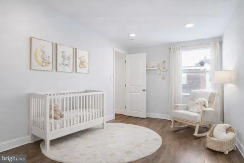 a view of livingroom with furniture and wooden floor