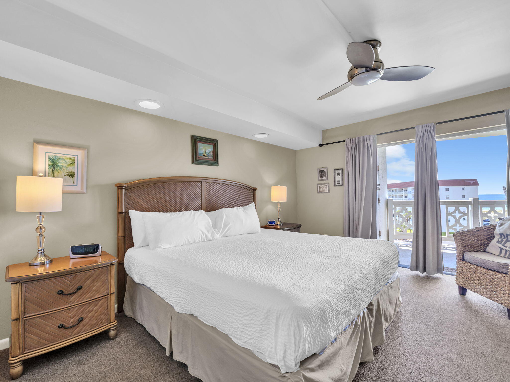 909 Santa Rosa Boulevard, Unit 165 Fort Walton Beach, FL 32548 - Photo 14 of 25 a bedroom with a bed and a chandelier