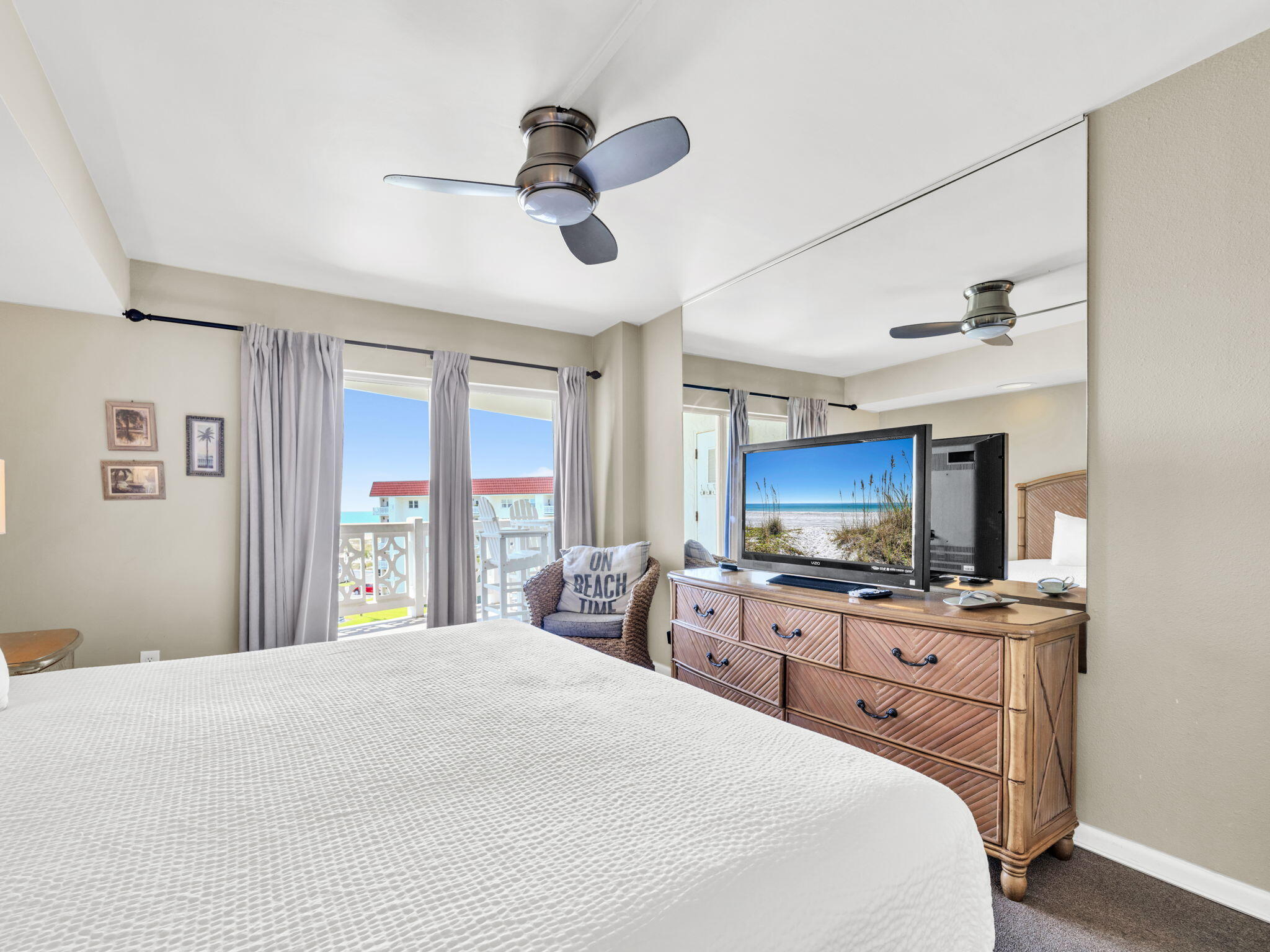 909 Santa Rosa Boulevard, Unit 165 Fort Walton Beach, FL 32548 - Photo 15 of 25 a bed room with a bed a television and a dresser