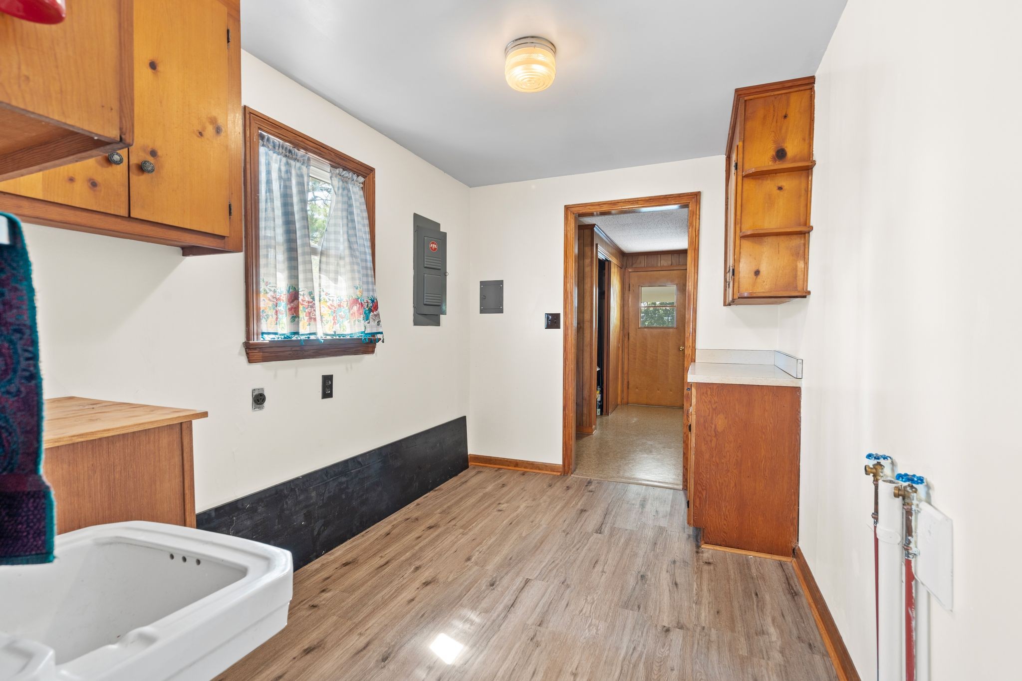 5295 Marion Road Cunningham, TN 37052 - Photo 16 of 33 a bathroom with a sink a bathtub and a window