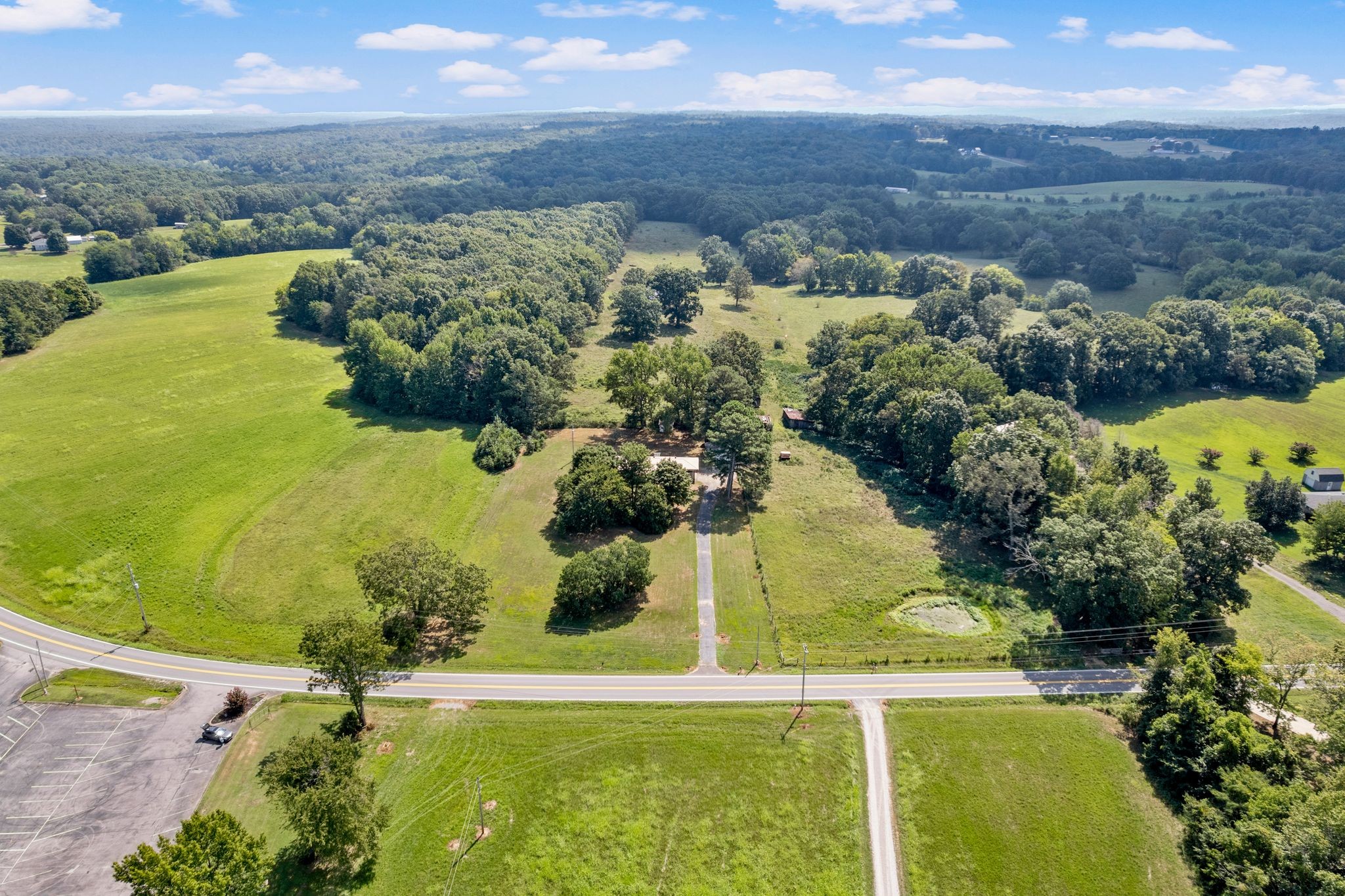 5295 Marion Road Cunningham, TN 37052 - Photo 2 of 33 an aerial view of residential houses with outdoor space