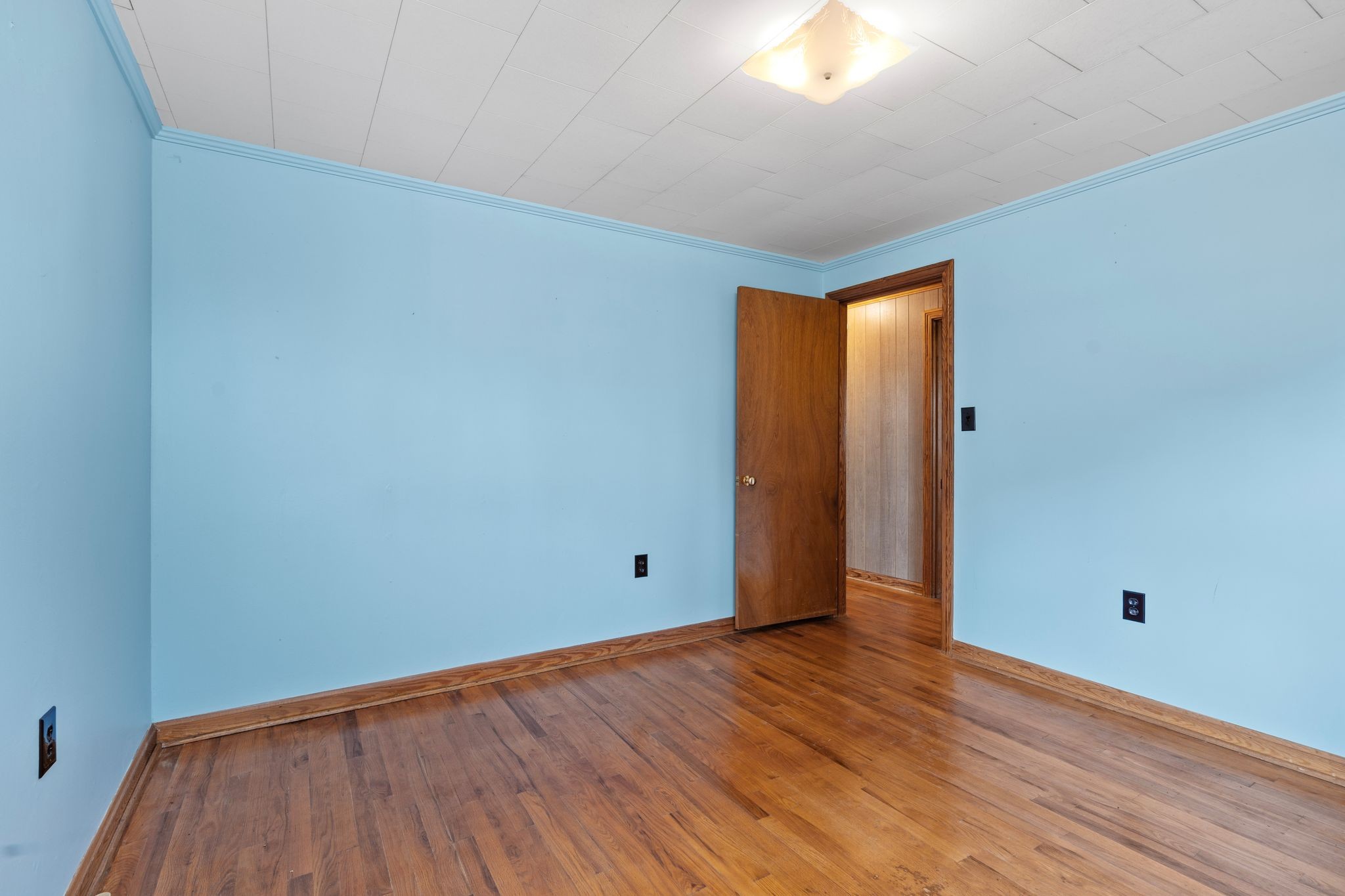 5295 Marion Road Cunningham, TN 37052 - Photo 25 of 33 a view of an empty room with wooden floor and closet