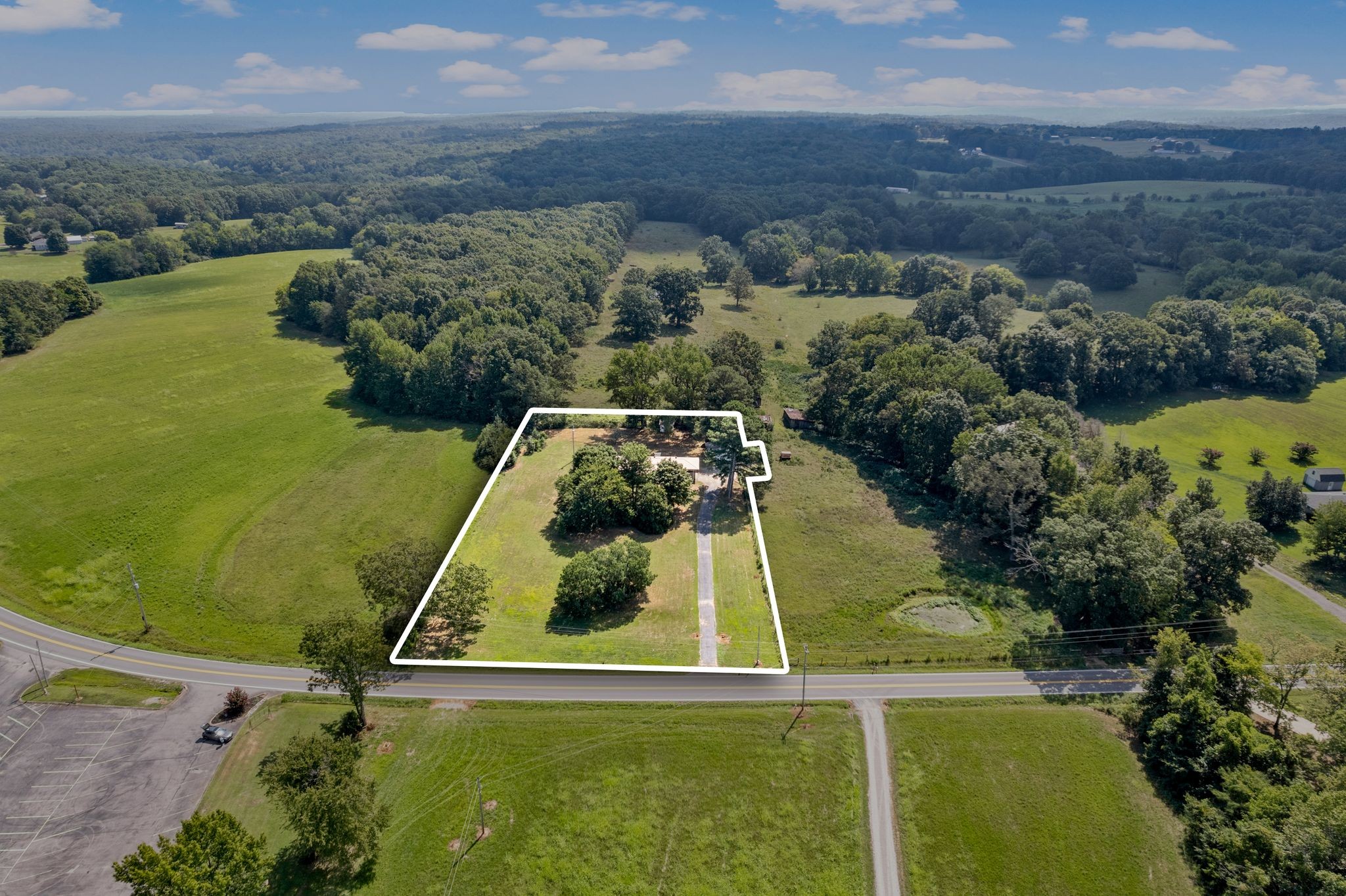 5295 Marion Road Cunningham, TN 37052 - Photo 3 of 33 an aerial view of residential houses with outdoor space