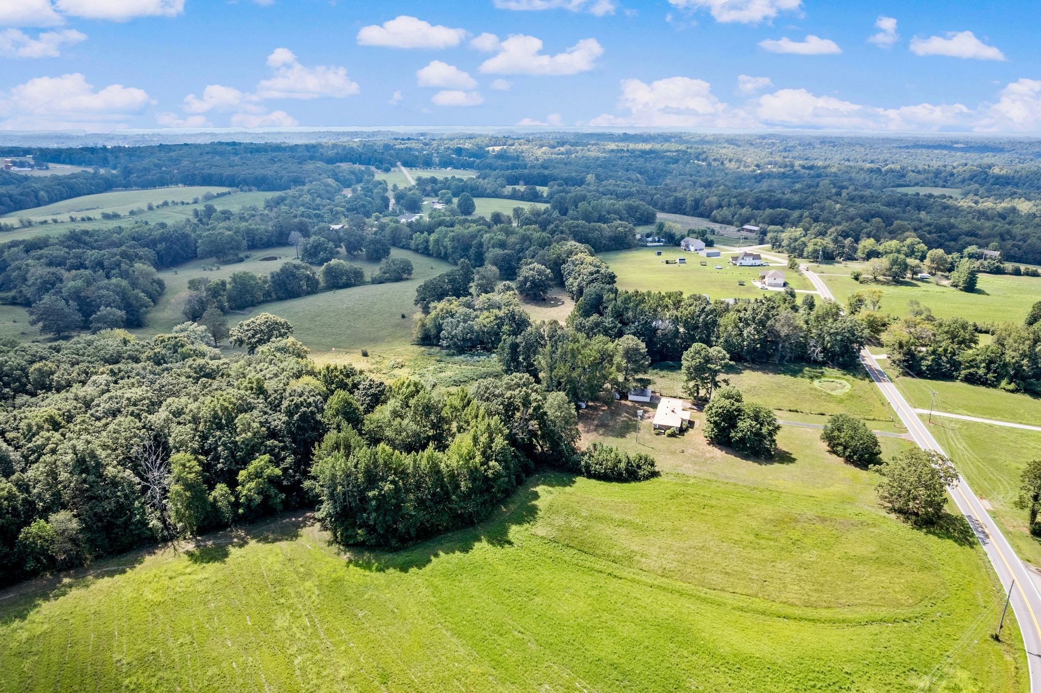 5295 Marion Road Cunningham, TN 37052 - Photo 5 of 33 a view of a lake with a mountain