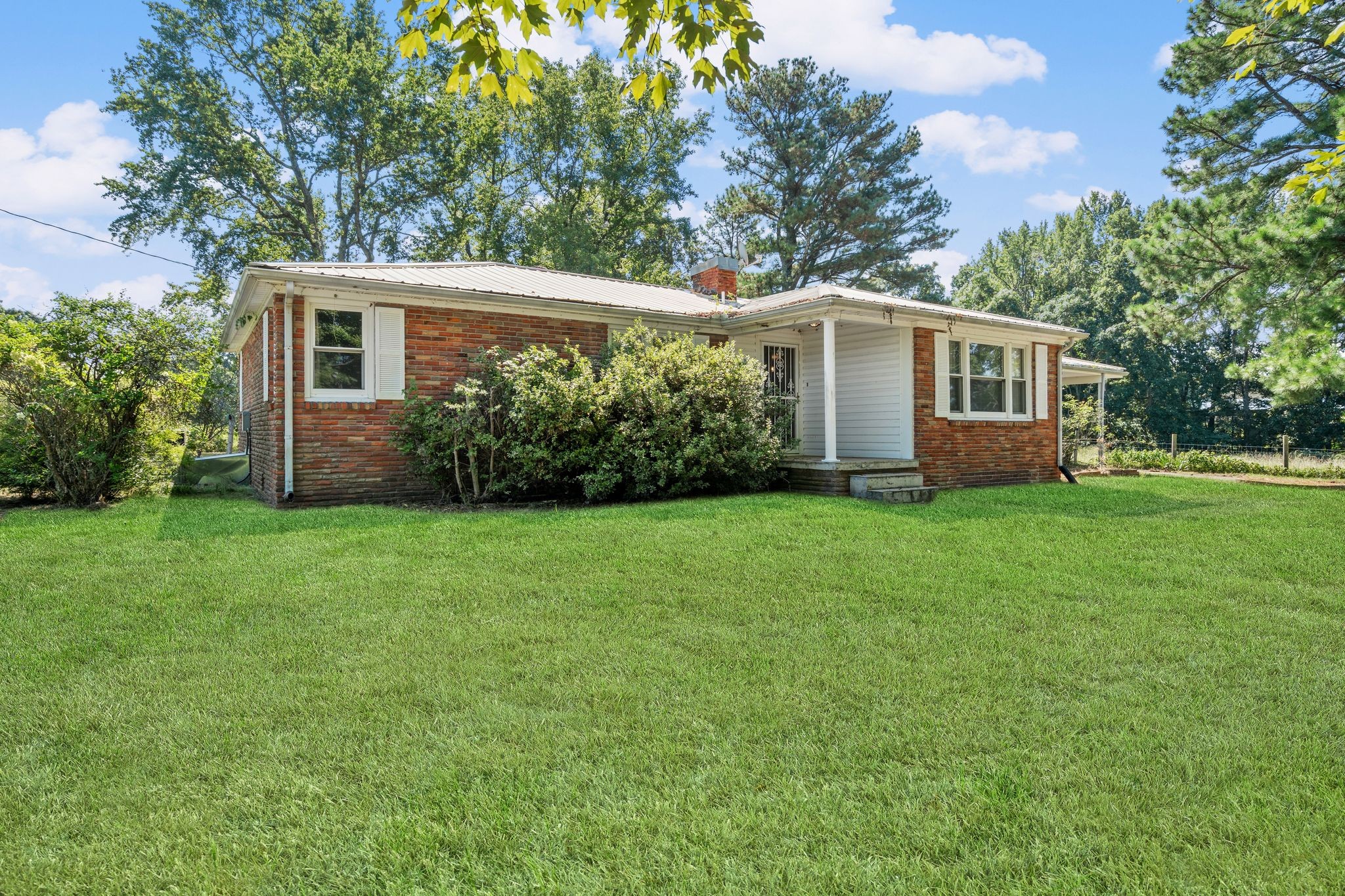 5295 Marion Road Cunningham, TN 37052 - Photo 7 of 33 a front view of house with yard and green space