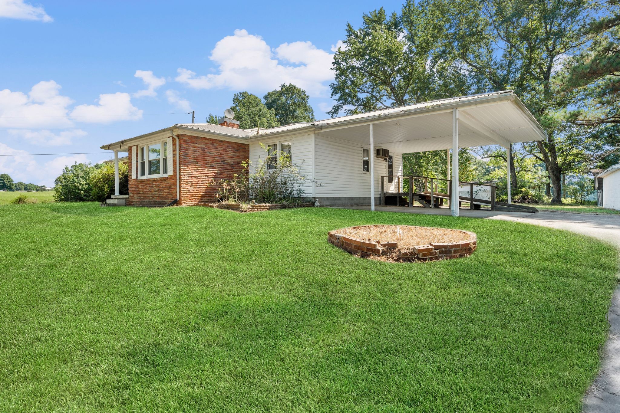 5295 Marion Road Cunningham, TN 37052 - Photo 8 of 33 a view of a house with a yard