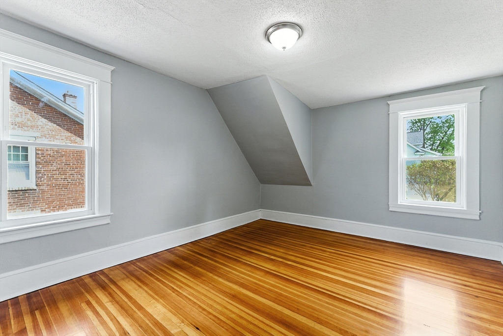 31 Fox Street West Springfield, MA 01089 - Photo 20 of 41 a view of a room with wooden floor and window