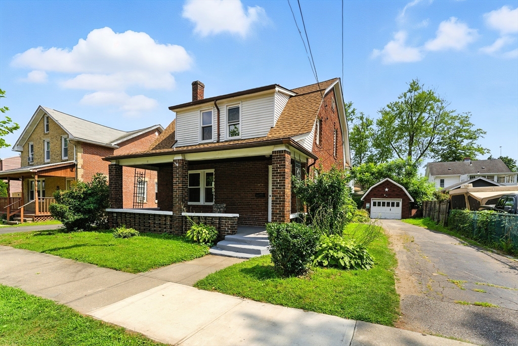 31 Fox Street West Springfield, MA 01089 - Photo 2 of 41 a front view of house with yard and green space
