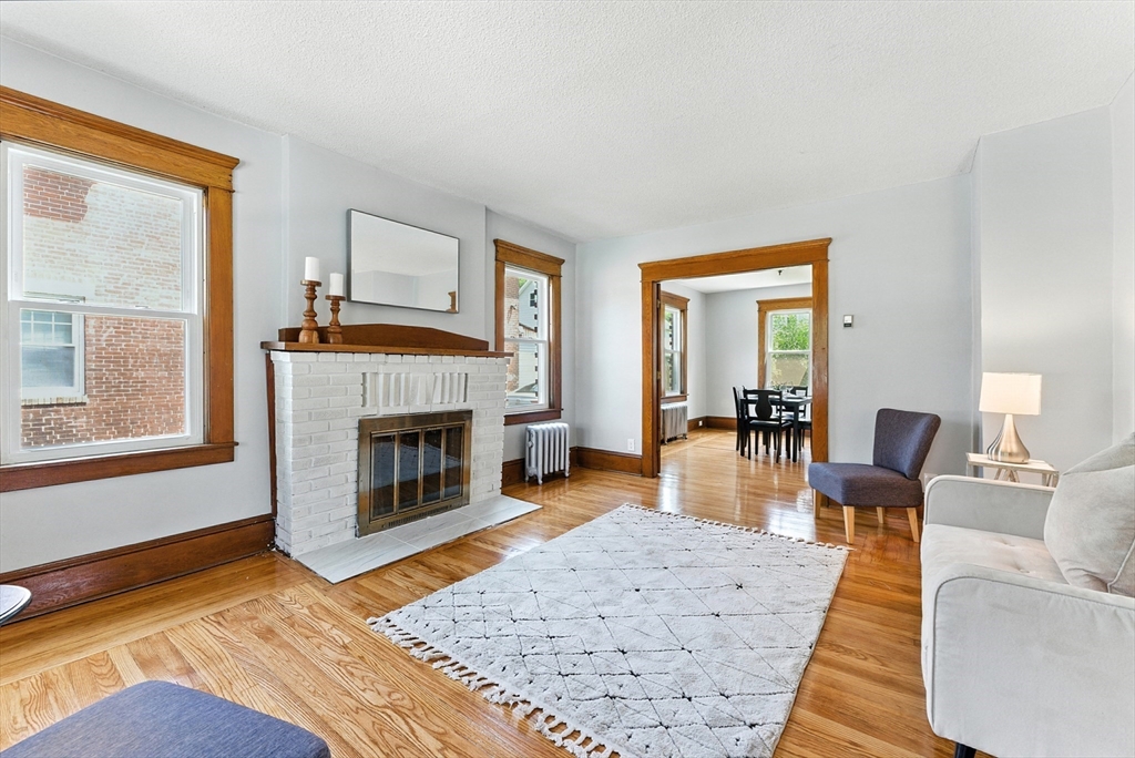 31 Fox Street West Springfield, MA 01089 - Photo 3 of 41 a living room with furniture and a fireplace