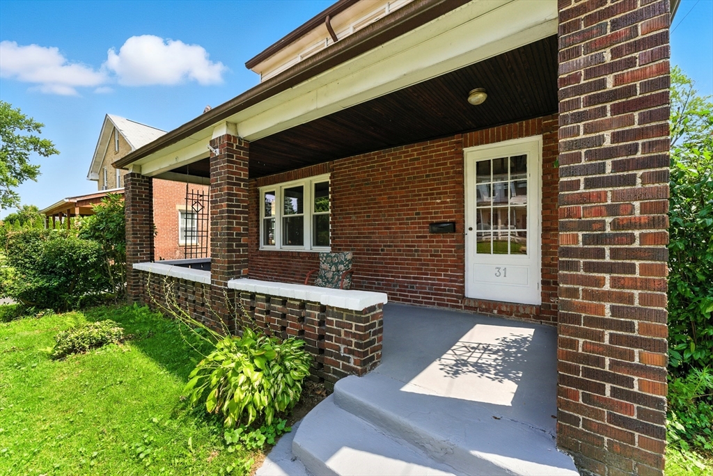 31 Fox Street West Springfield, MA 01089 - Photo 35 of 41 a front view of a house with garden