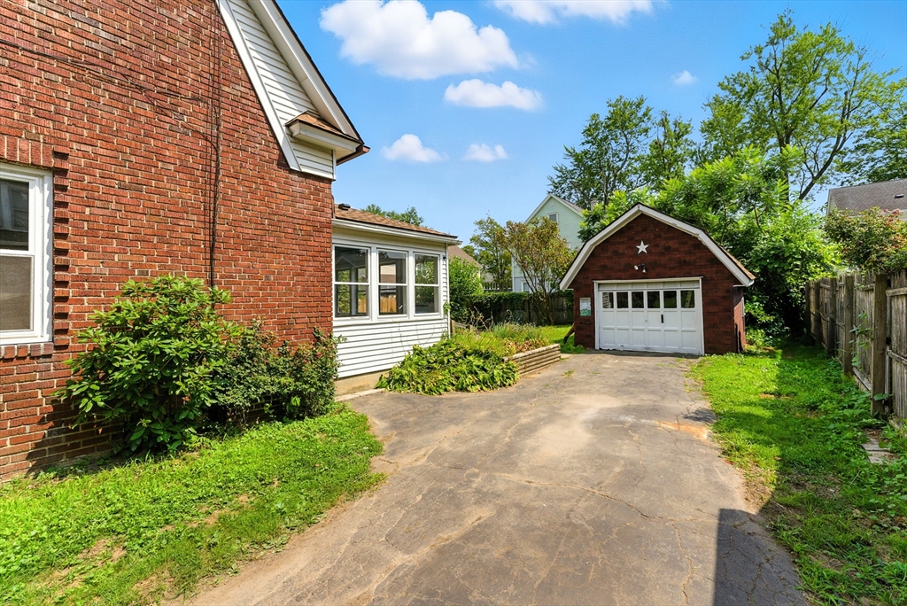 31 Fox Street West Springfield, MA 01089 - Photo 36 of 41 a front view of a house with garden