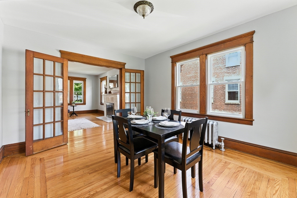 31 Fox Street West Springfield, MA 01089 - Photo 7 of 41 a view of a dining room with furniture and wooden floor