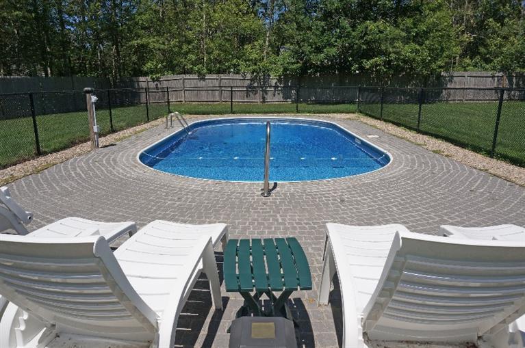 108 Old Mill Road Marstons Mills, MA 02648 - Photo 27 of 35 a view of backyard with swimming pool and seating