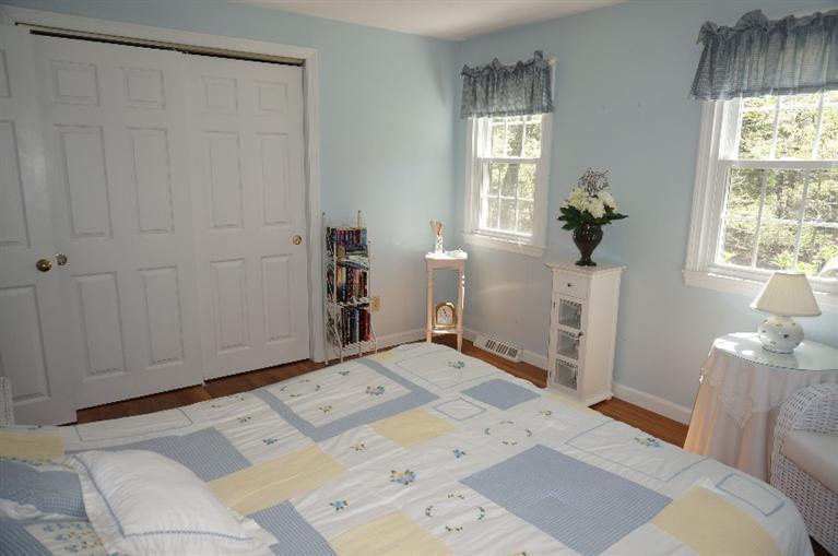 108 Old Mill Road Marstons Mills, MA 02648 - Photo 3 of 35 a bed room with a bed and a window
