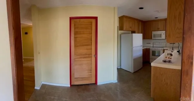 a utility room with washer and dryer