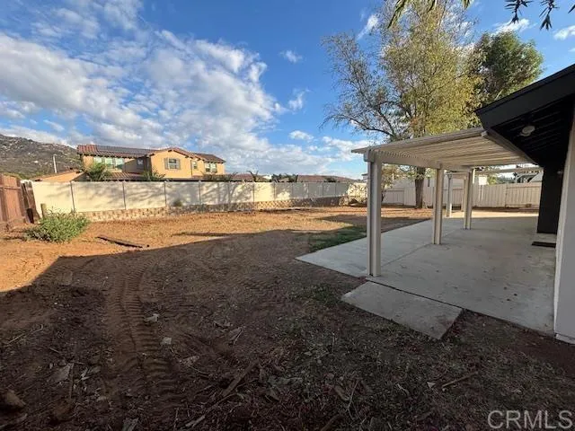 a view of a yard with an outdoor space