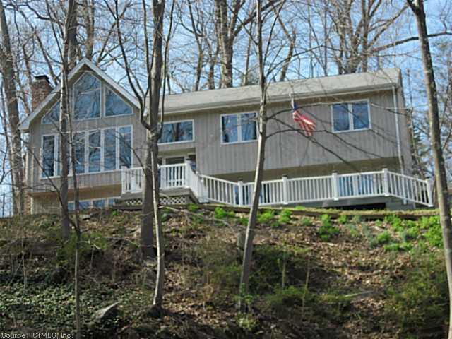 135 Brewster Road Bristol, CT 06010 - Photo 1 of 1 a house that has a lot of plants in it