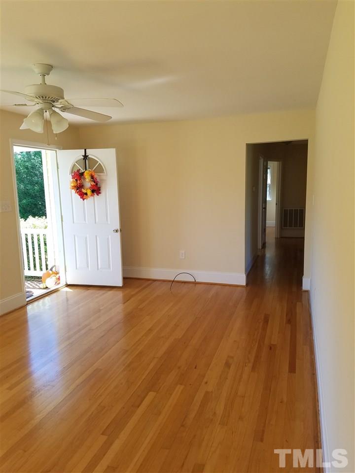10328 Pasture Road Middlesex, NC 27557 - Photo 5 of 23 wooden floor in an empty room with a window