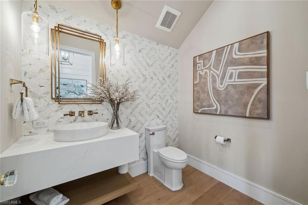 187 10th Avenue South Naples, FL 34102 - Photo 22 of 50 Powder room