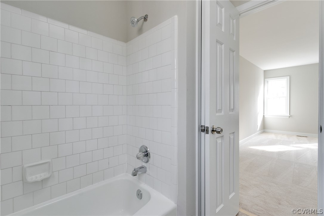 1018 Ashbrook Landing Road Midlothian, VA 23114 - Photo 14 of 46 a bathroom with a bathtub