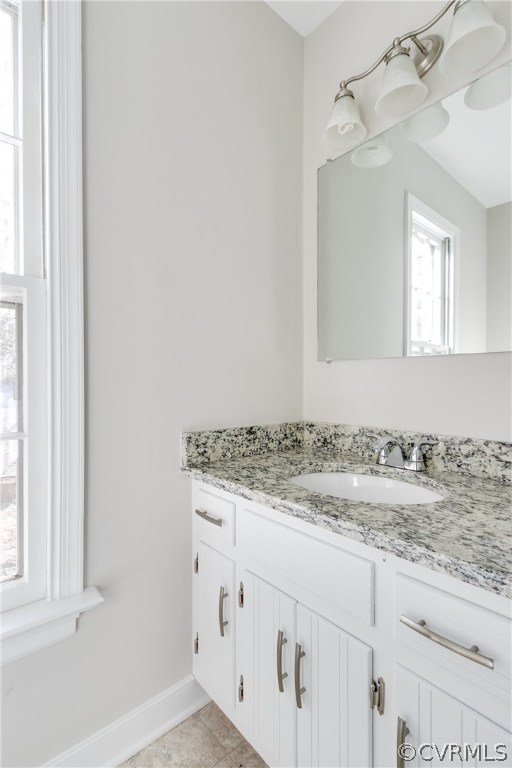 1018 Ashbrook Landing Road Midlothian, VA 23114 - Photo 23 of 46 a bathroom with a granite countertop sink and a mirror