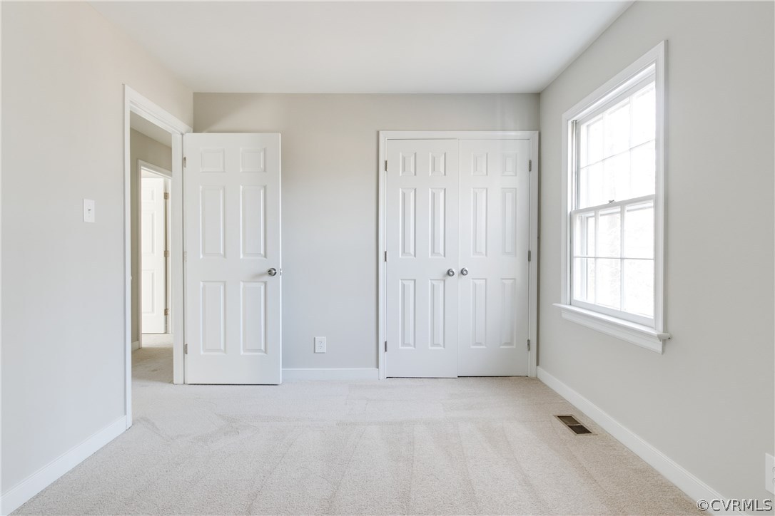 1018 Ashbrook Landing Road Midlothian, VA 23114 - Photo 24 of 46 an empty room with windows