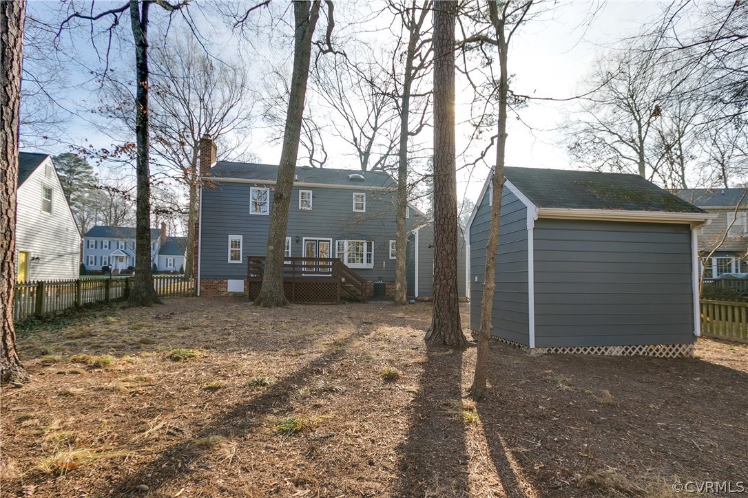 1018 Ashbrook Landing Road Midlothian, VA 23114 - Photo 42 of 46 a view of a house with a yard and garage